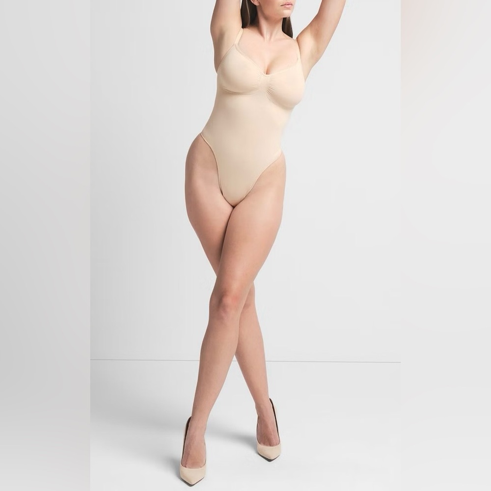 SKIMS Seamless Sculpt Thong Bodysuit In Tan Size S/M